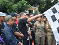 Peringati Hari Amal Bhakti ke-77, Sekdaprov Lepas Peserta Jalan Sehat di Kota Metro